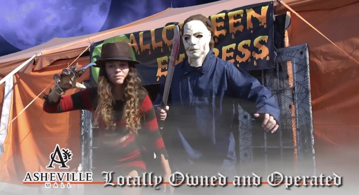 Costumed characters at the tent entrance