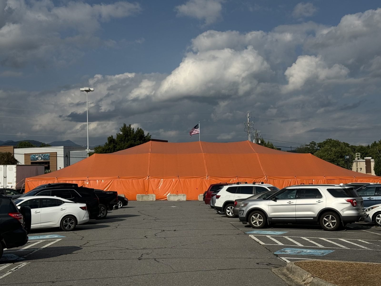 The big orange tent in the Asheville Mall parking lot
